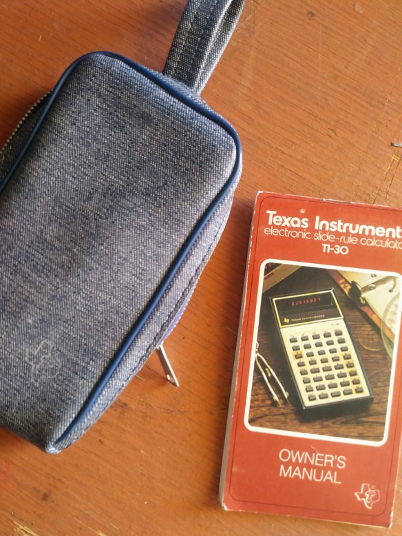 donated - case and manual from a TI-30 (1980's) calculator